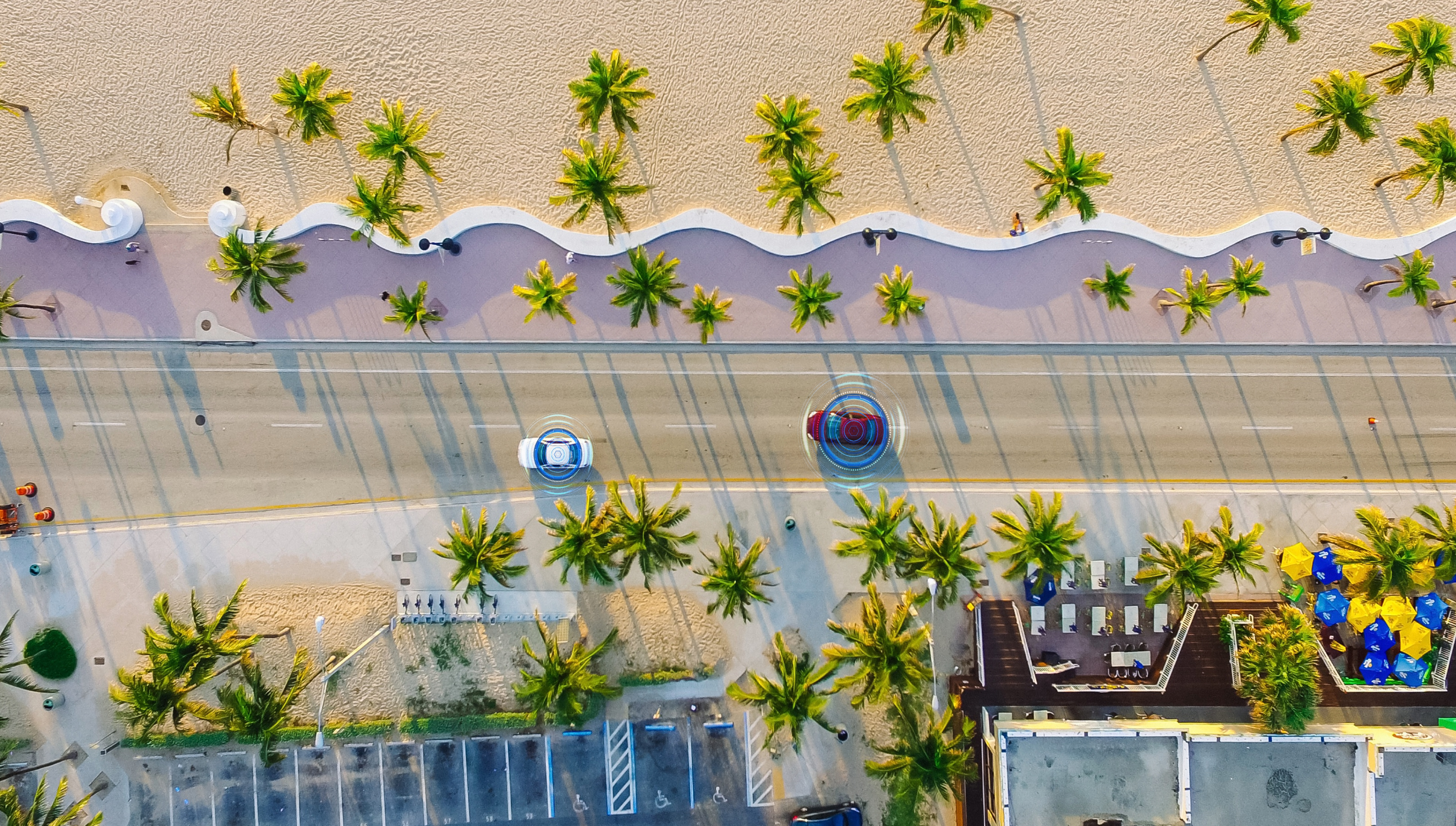 Self-driving cars on a beach road