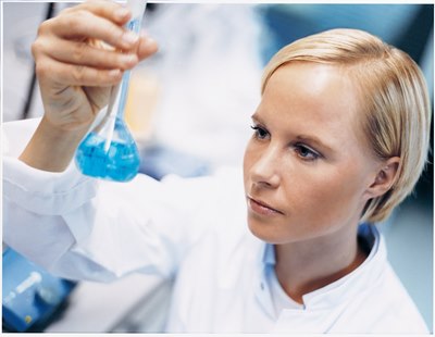 Beiersdorf scientist with flask