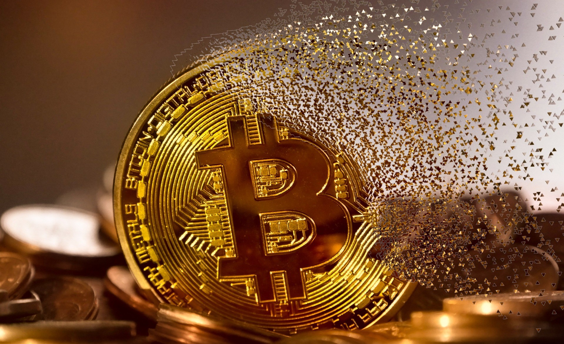 A physical Bitcoin gradually evaporating into pixels