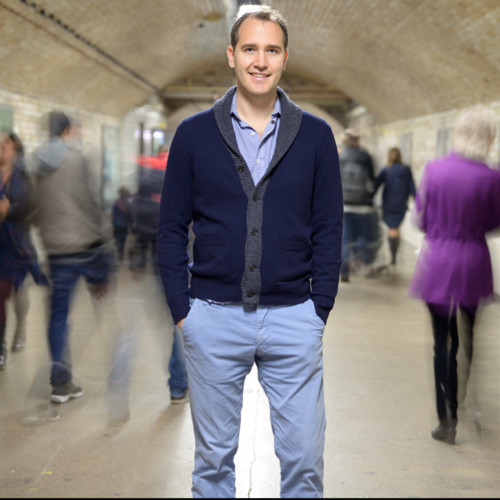 Joerg Landsch standing in subway tunnel with hands in pockets