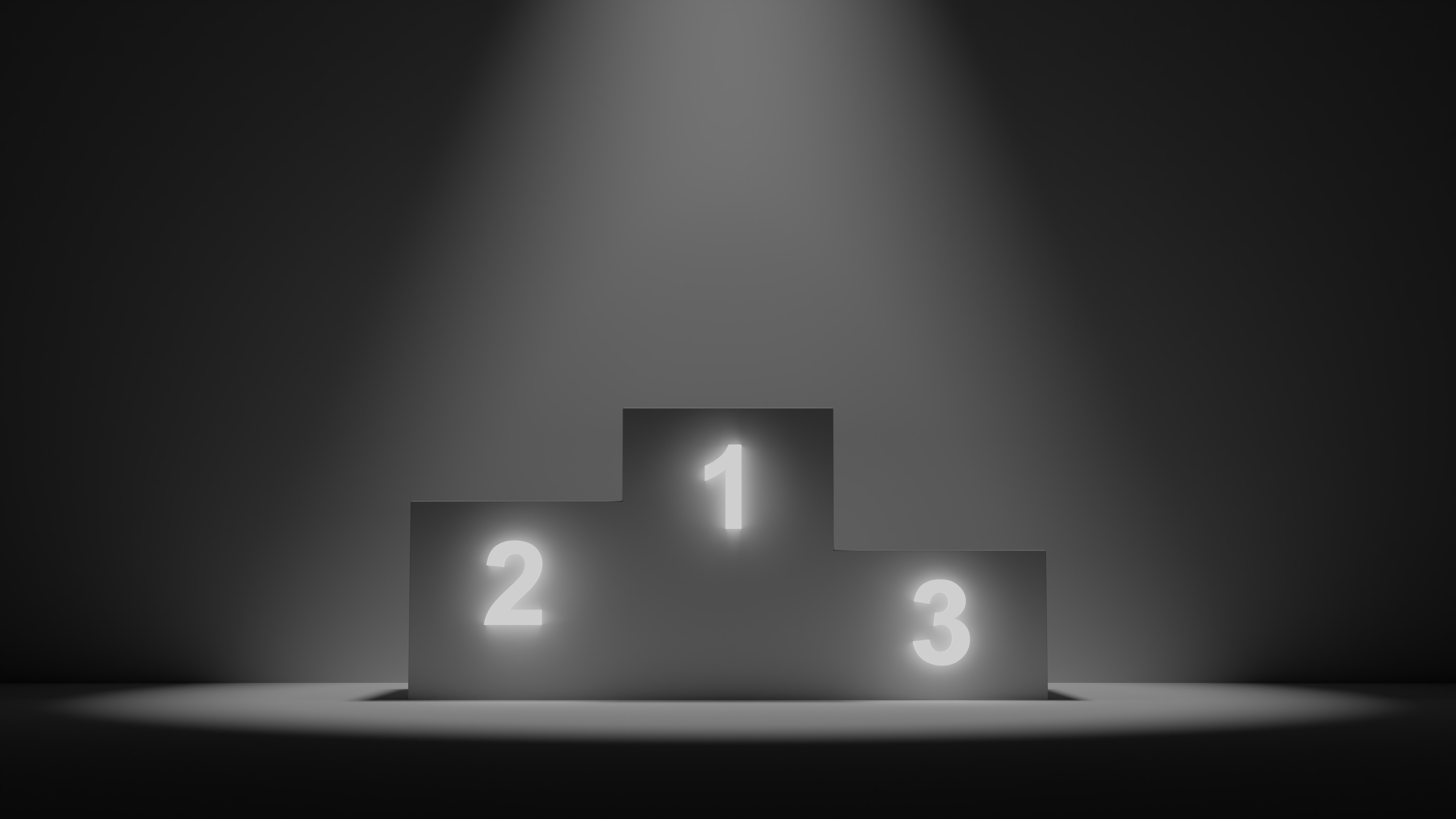 a black and white photo of a podium with the numbers 1, 2 and 3 all lit up