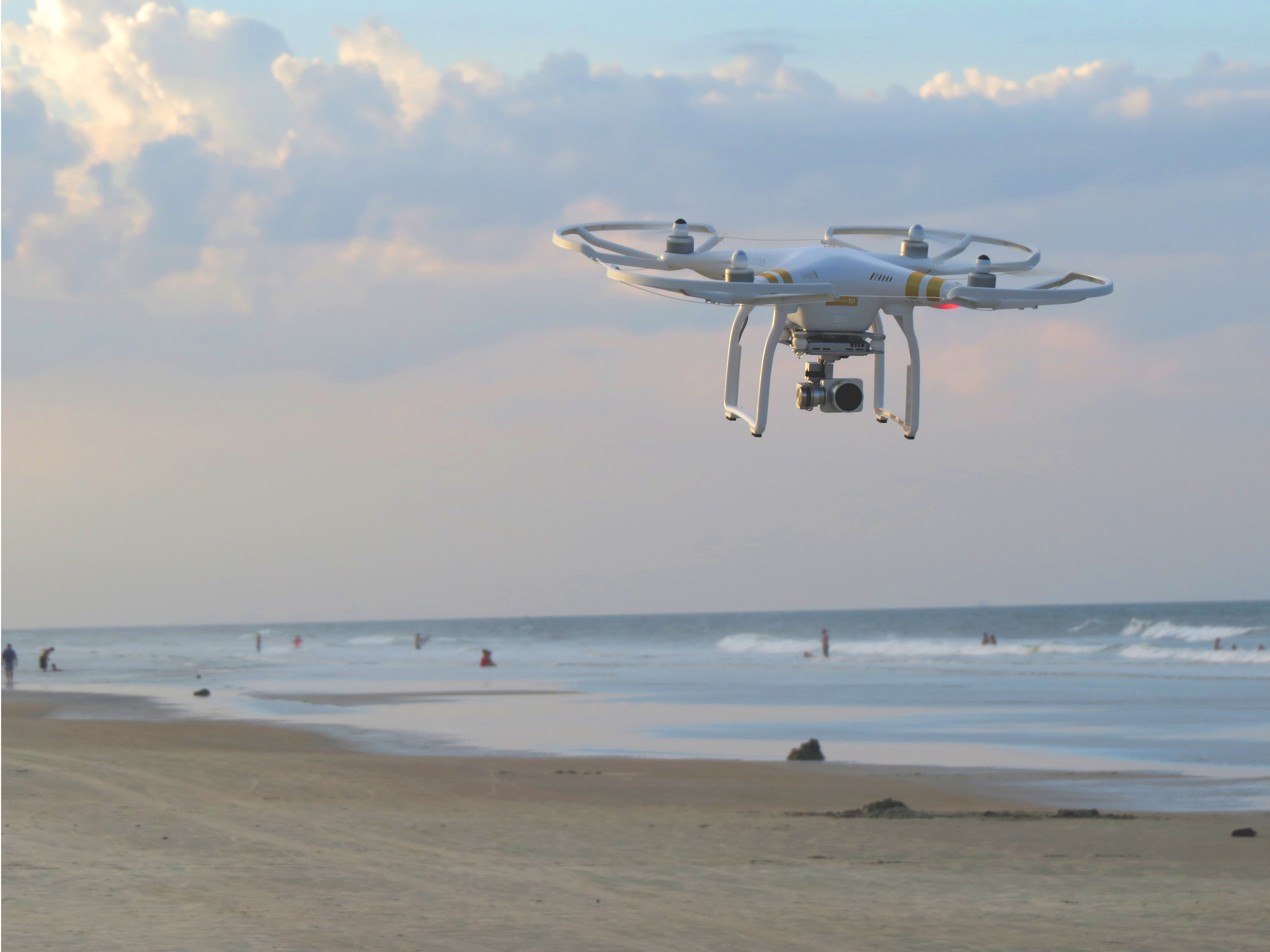 Drone hovering over a bearch