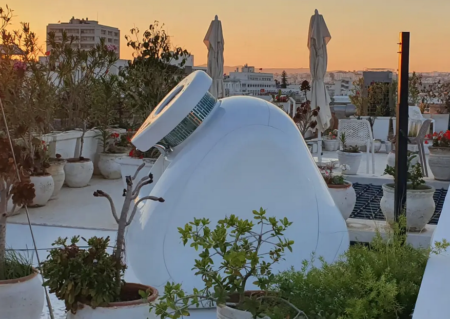 Kumulus Water system on a city rooftop at sunset