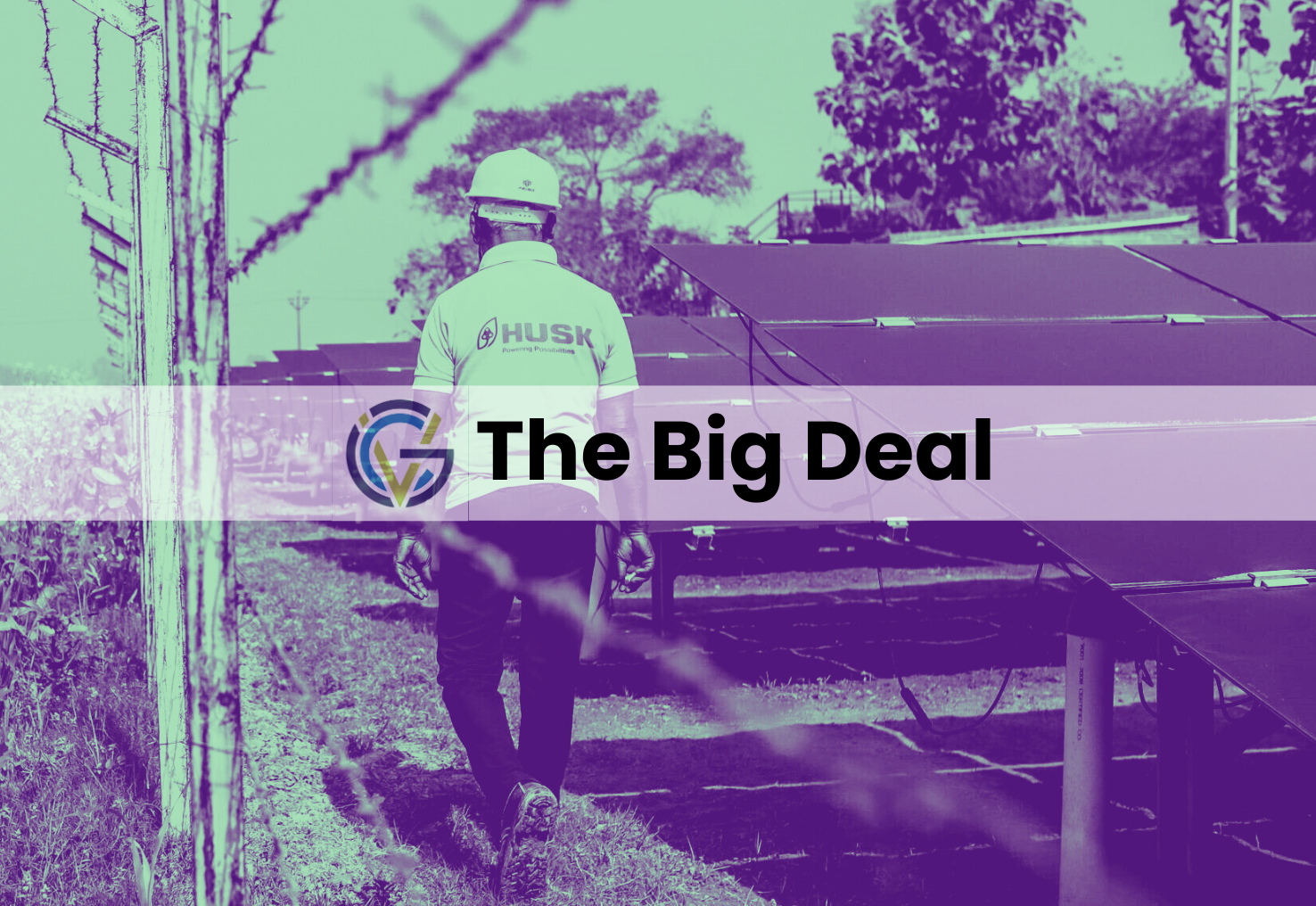 Worker in hard hat tours rural solar installation, in aqua and violet filter