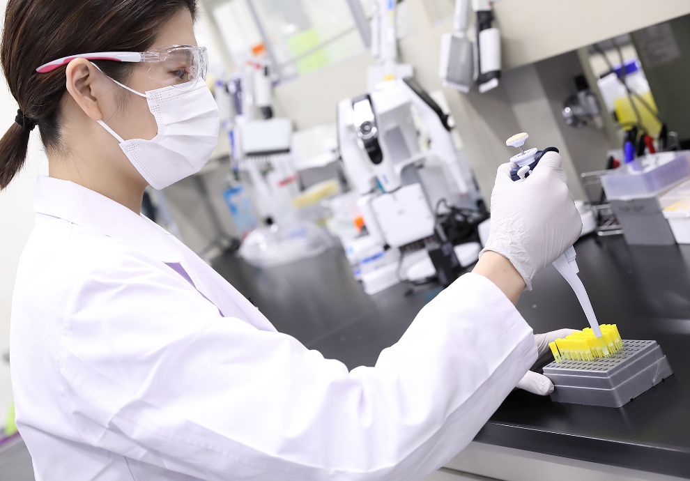 A drug developer in a lab. Image courtesy of Taiho Pharmaceutical.
