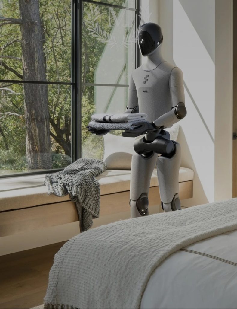 A Figure robot carrying towels in someone's bedroom