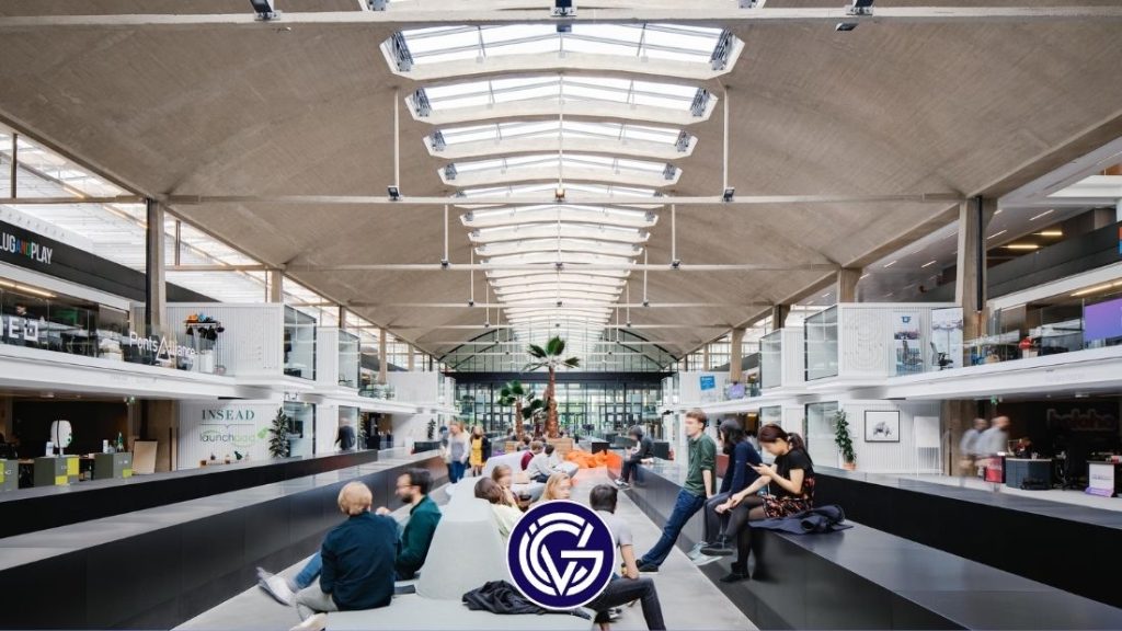 The interior of Station F, with a GCV logo on the front