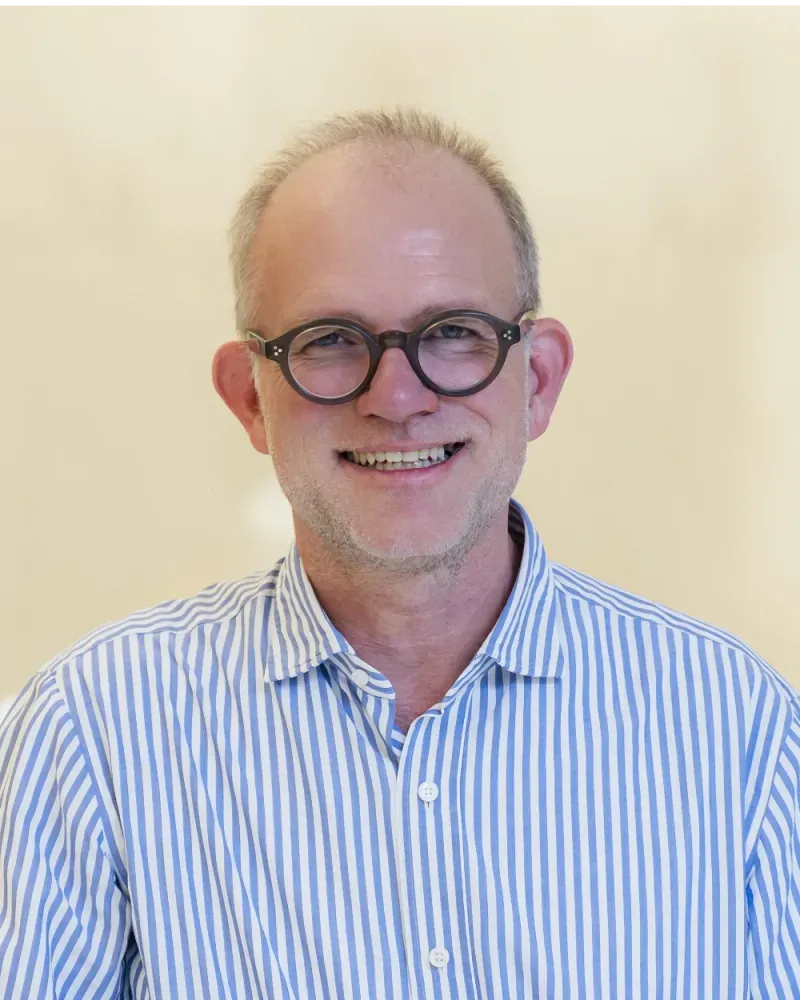 Niko Waesche of German Media Pool in a striped shirt